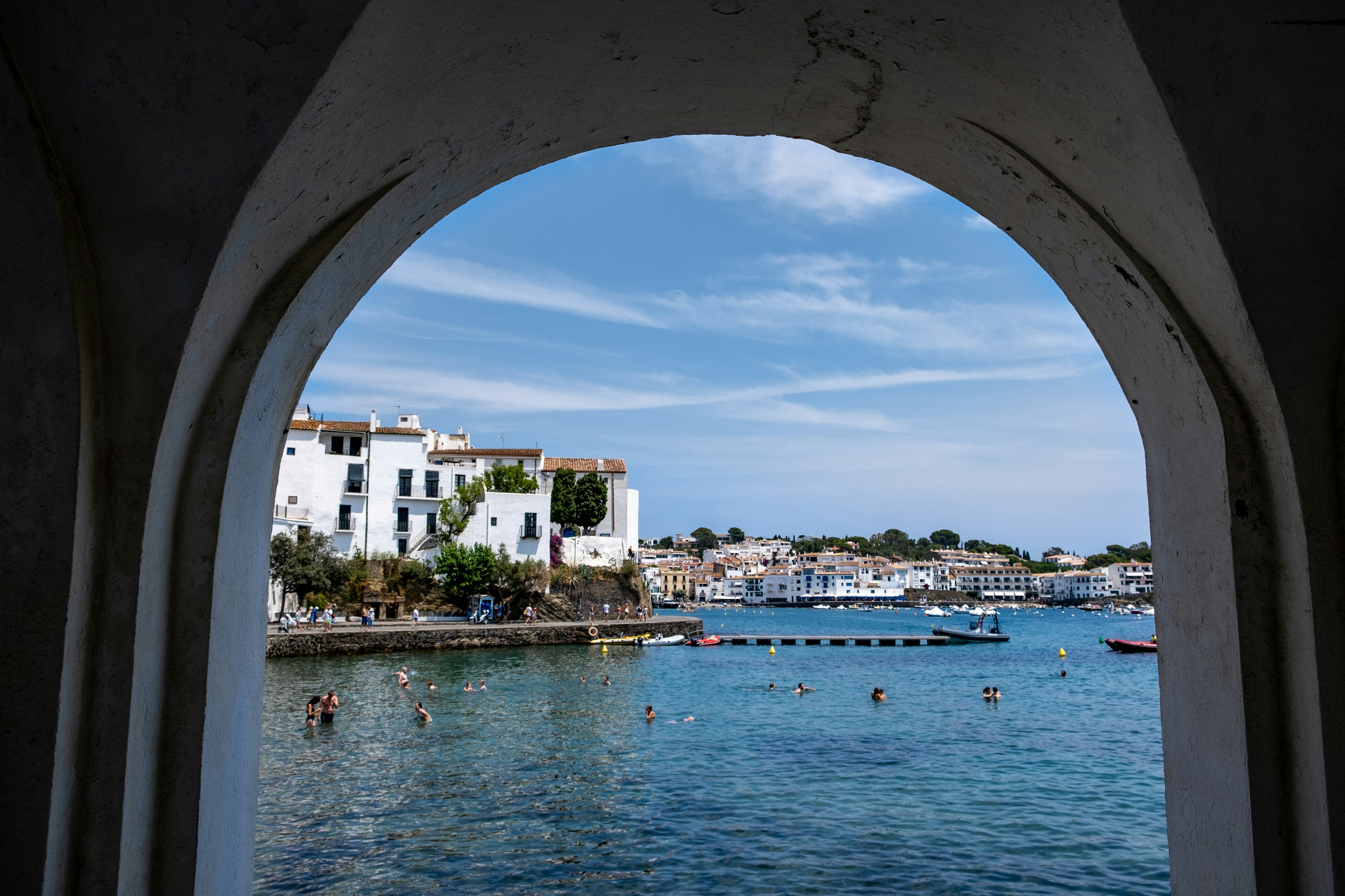 view of people on sea from window